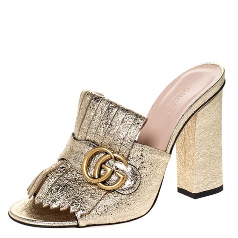 gucci mules gold|Gucci suede mules.